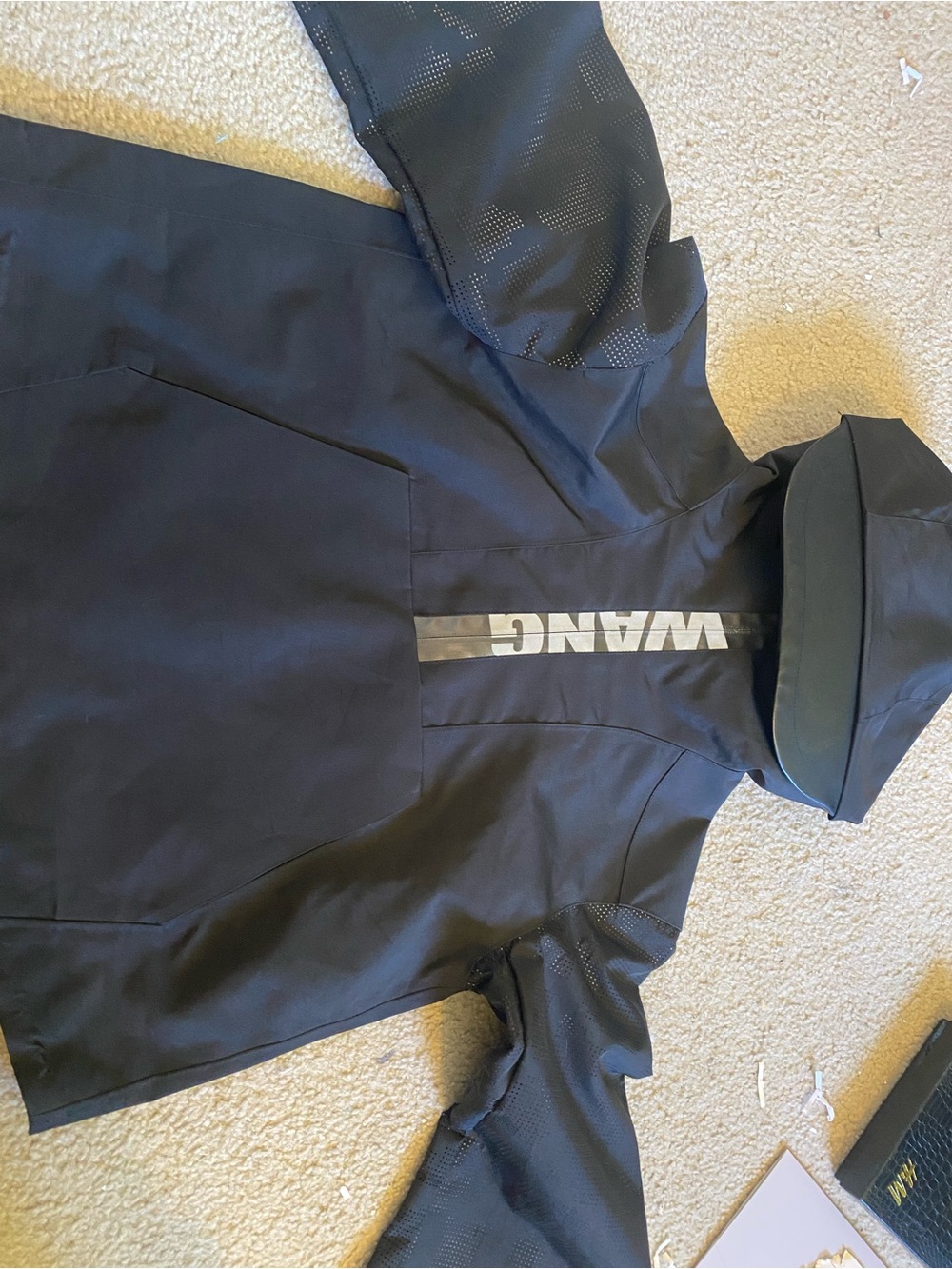 Alexander Wang x H&M collaboration quarter zip rain jacket